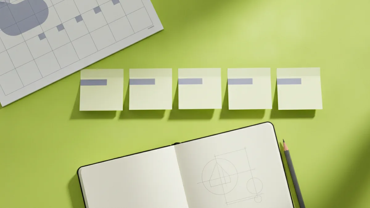 Calendar and notes arranged to represent a realistic logo schedule