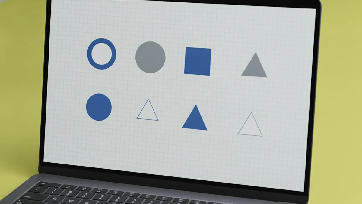Monochrome logo shapes being refined in digital design